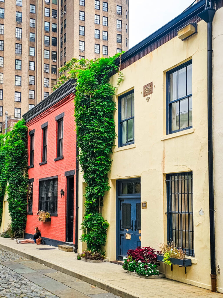 old carriage houses with ivy on them