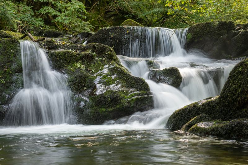 waterfall on the Hoar Oak Water river at Watersmeet in Exmoor National Park