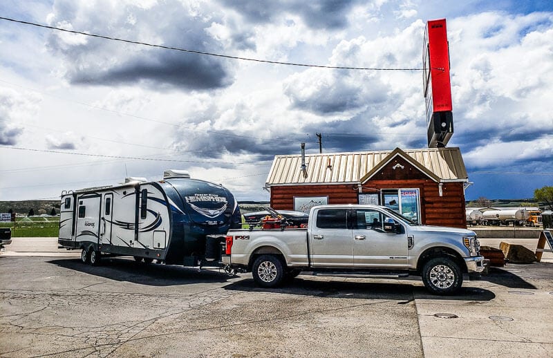 car and rv at Wanderlust Cowgirl Coffee drive through in Panguitch,