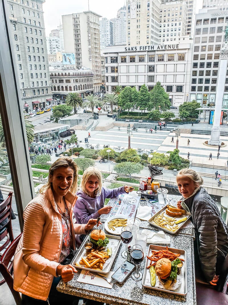 family eating at table in Union Square San Francisco