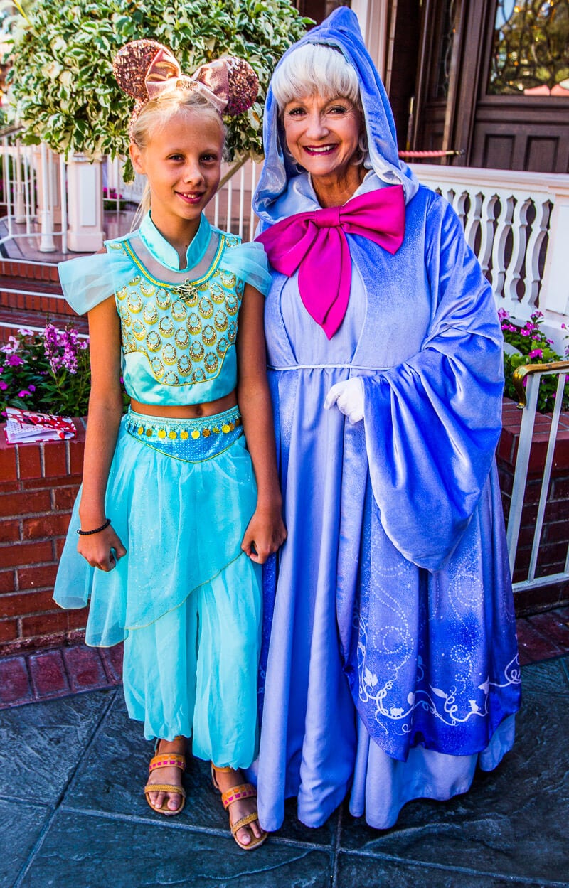 girl posing with The Fairy Godmother Disneyland Anaheim