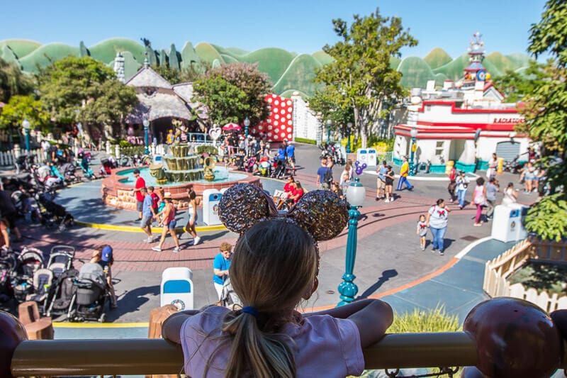 girl looking at ToonTown Disneyland Anaheim