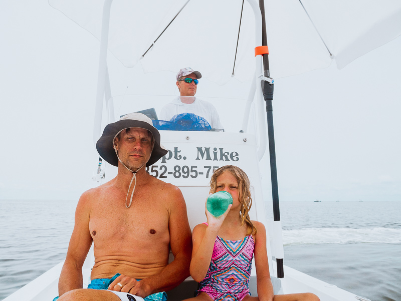 father and daughter on scallop boat