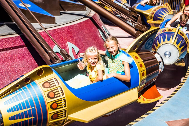 young girls on Astro Orbitor in Tomorrowland, Disneyland