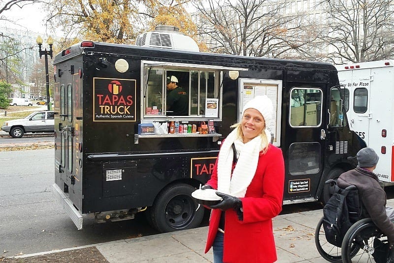 woman standing in front of Food truck scene, Washington DC