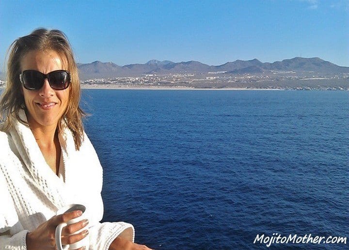 a woman standing on a boat deck