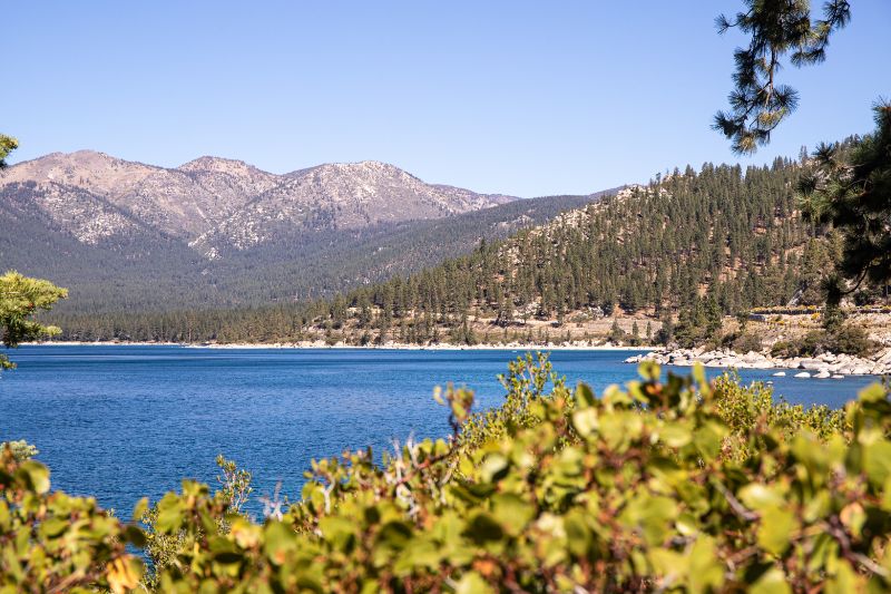 water with mountains in the background