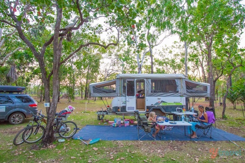 caravan in a wooded area