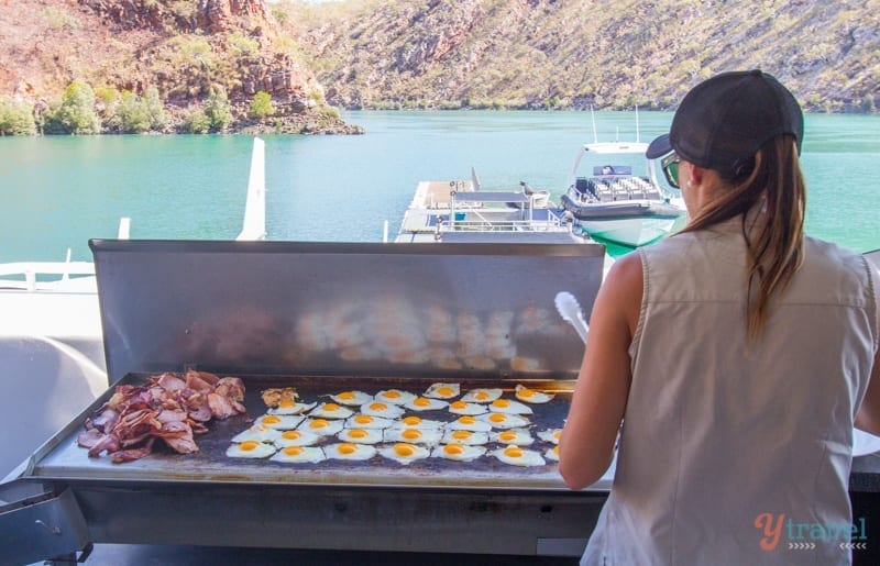 woman cooking bbq breakfast