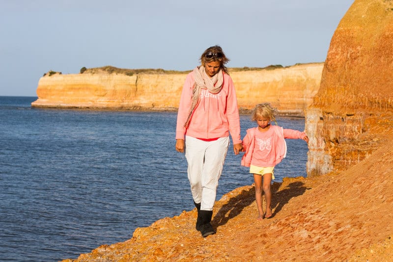 woman and child walking at Redbank Cliffs in American River 