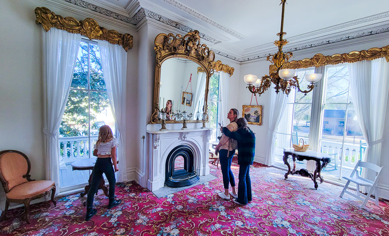 family inside living room of Bellamy House, Wilmington