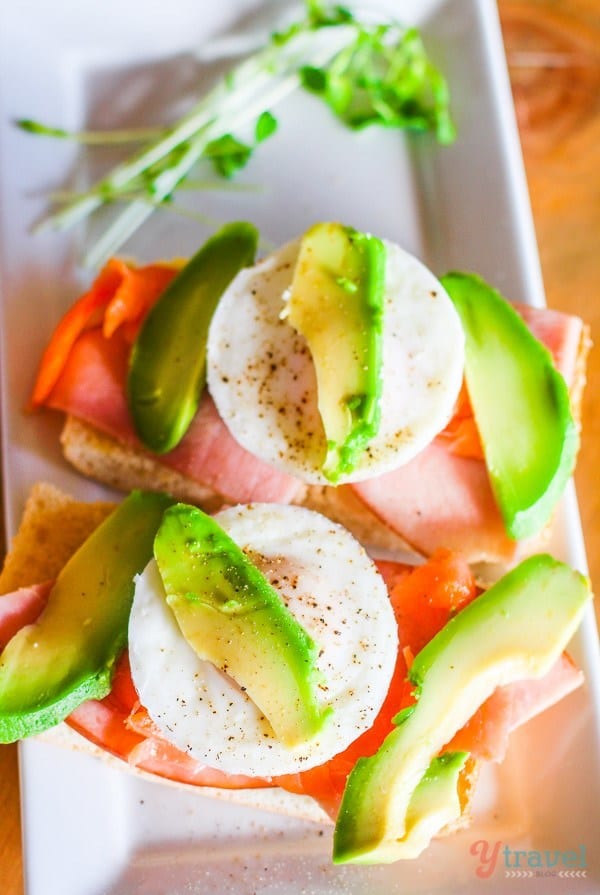 toast with ham, salmon, egg and avocado