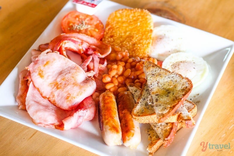 Breakfast plate of eggs, bacon, sausage, toast and hash browns at Elz Bistro in the Bunya Mountains, Queensland, Australia