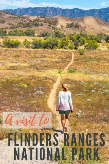 woman walking on a dirt path