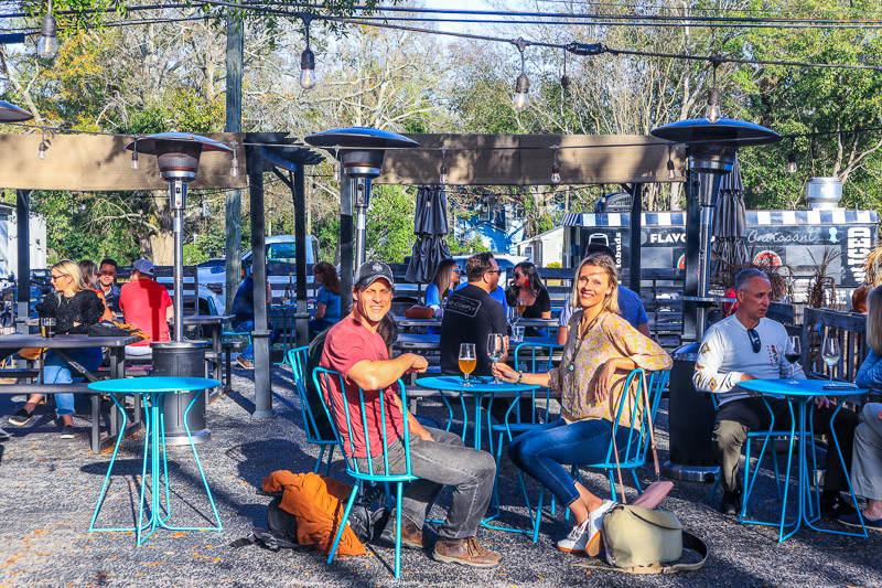 couple sitting in FlyTrap Brewing beer garden