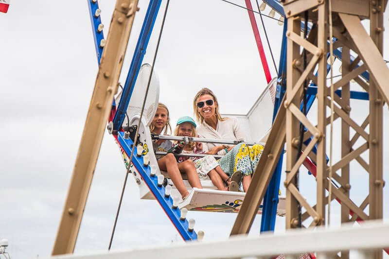 women and girls on ferris wheel