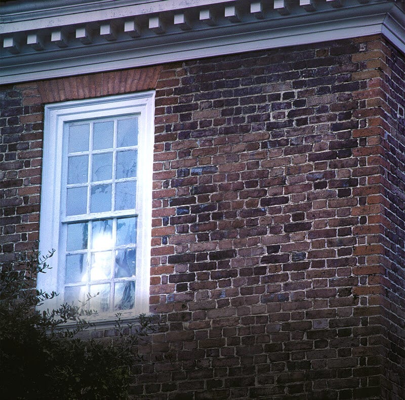 Ghosts in window of building at wiliamsburg