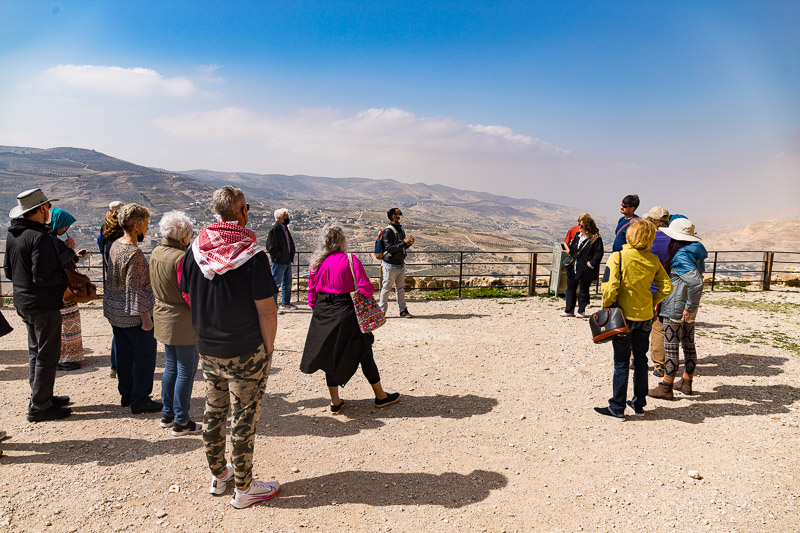 group listening to tour guide