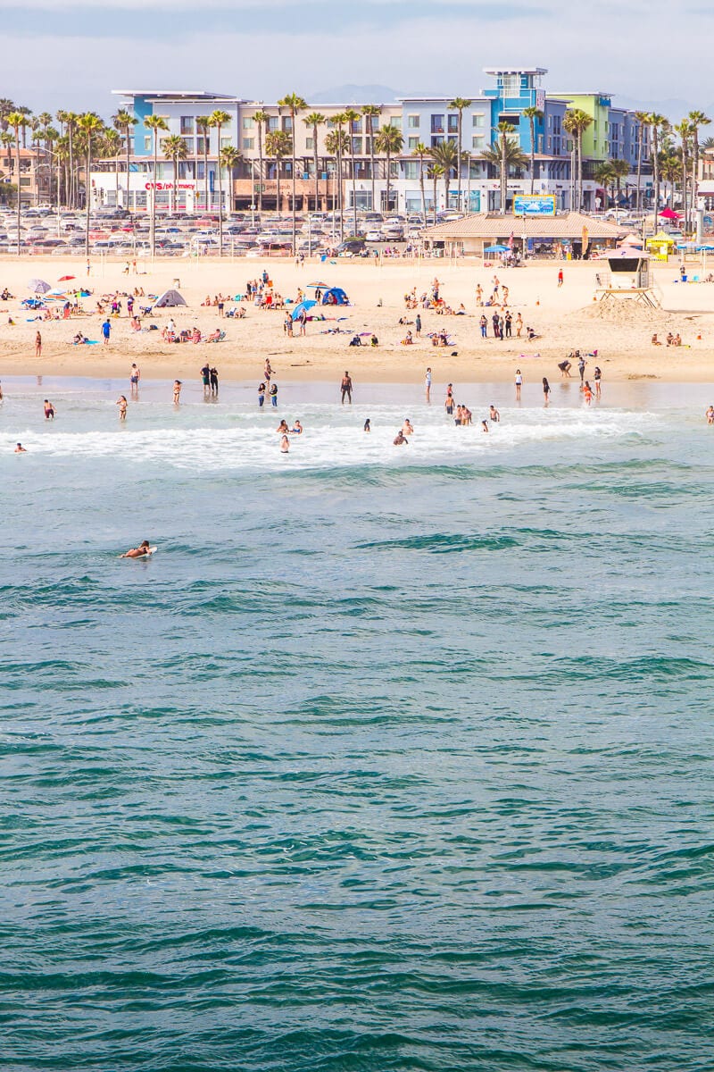 crowds enjoying hujntington beach