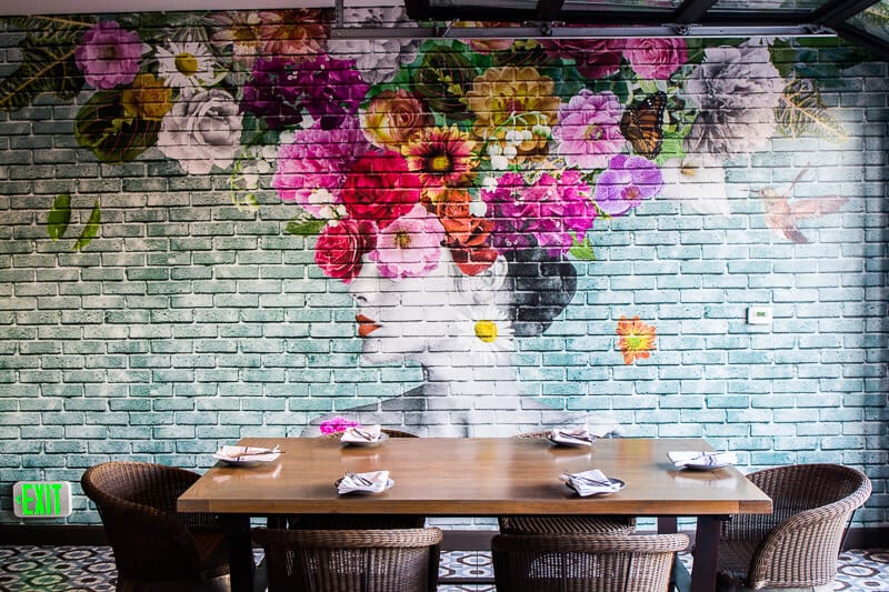 mural of woman with flowers on head Pacific Hideaway, Kimpton Shorebreak