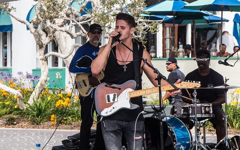 man singing on microphone