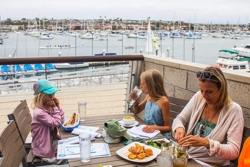 people sitting at a table eating