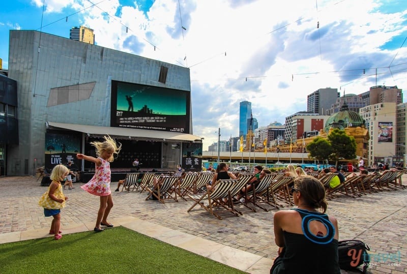 Savannah & Kalyra dancing to the music at Federation Square Melbourne