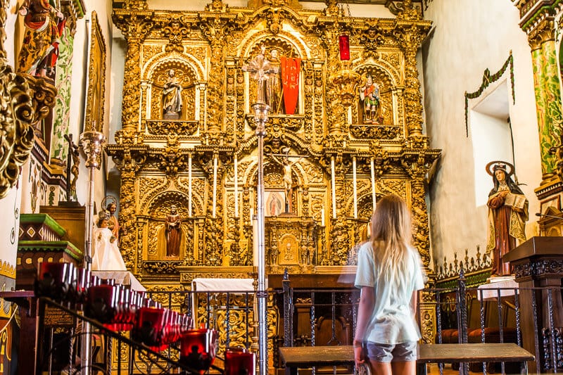 girl standing in a church