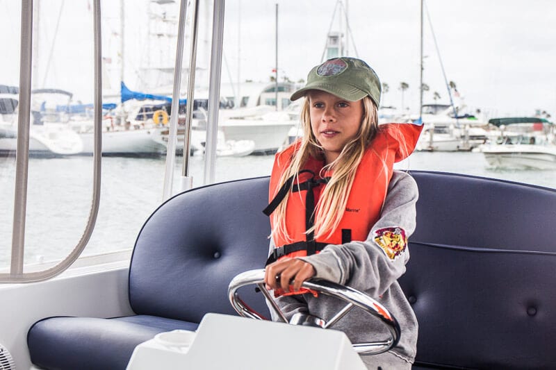 girl sitting on a boat