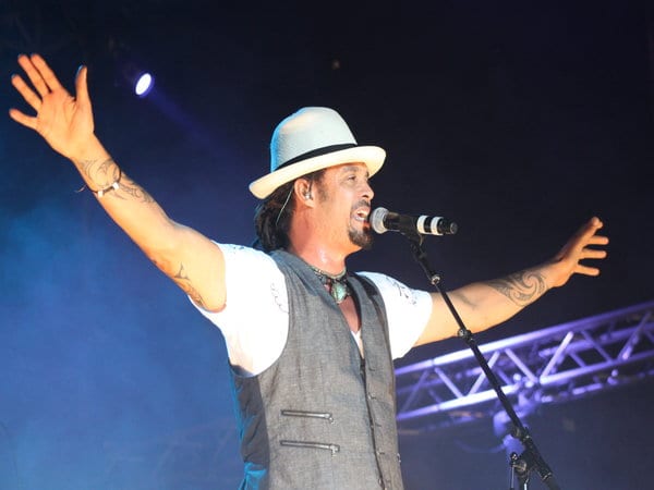 michael franti singing on stage