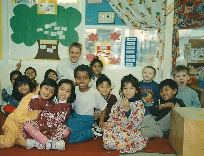 kids sitting on a carpet