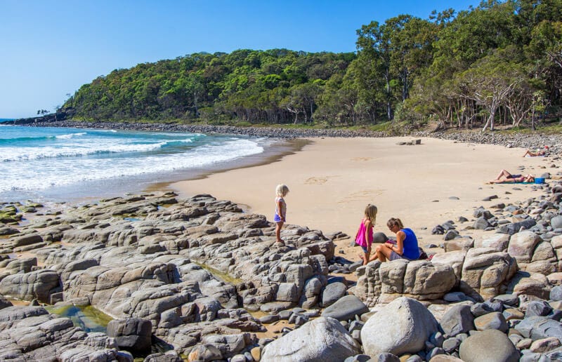 woman and child on Tea Tree Bay in Noosa Heads National Park -