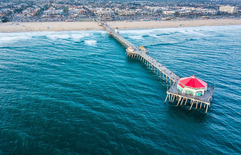 aerial view of huntington beach pier with beach in background