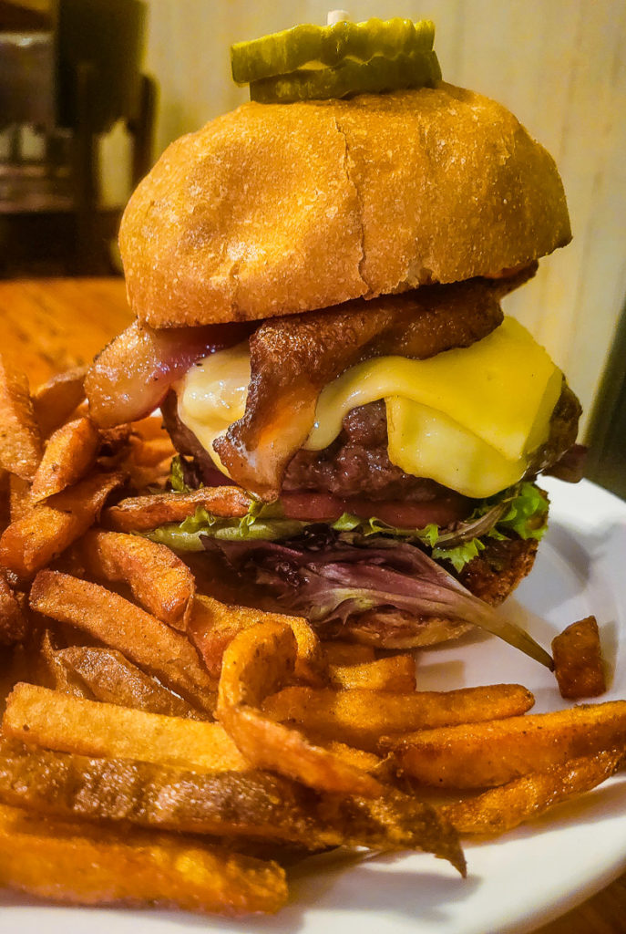 burger and fries on plate