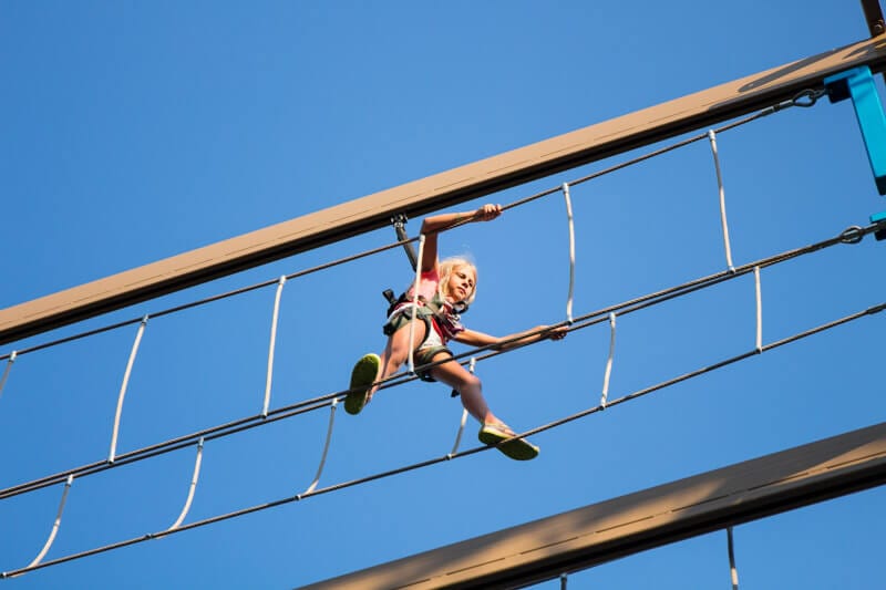 girl on High ropes course 