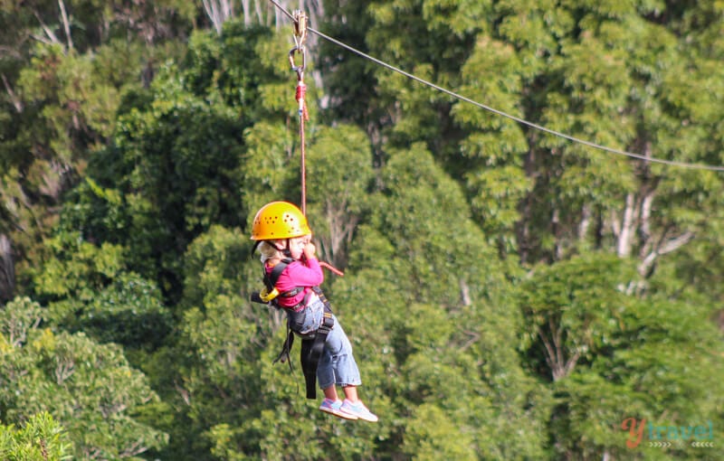 young girl on flying fox