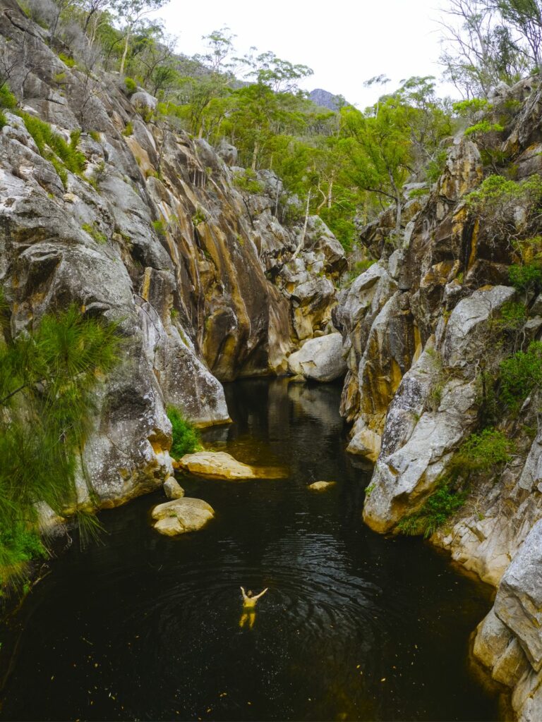 people in swimming hole mt barney