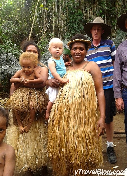 women holding children