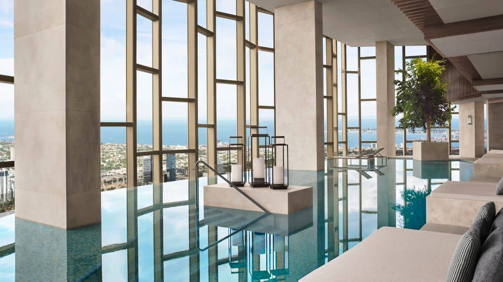 ritz Carlton Melbourne pool with Melbourne city and ocean views