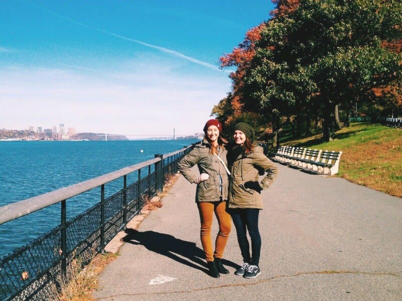 girls posing beside river in Riverside Park -