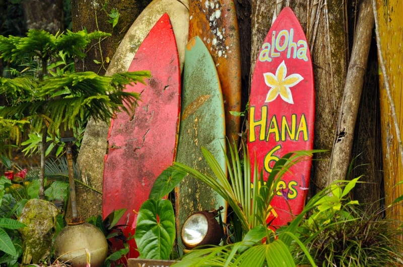 The road to hana sign on surfboard